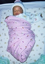baby sofia in pink blanket